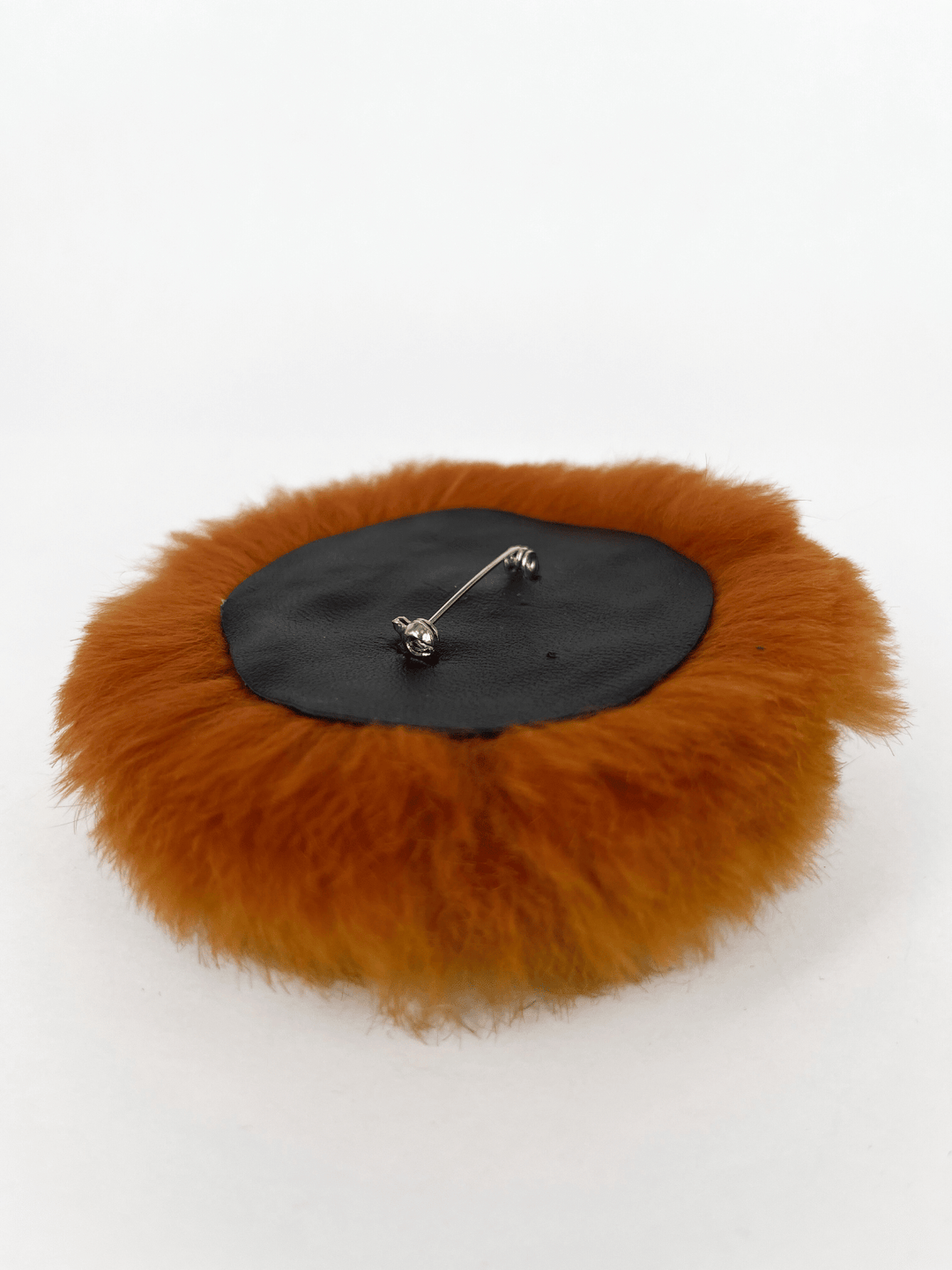 Orange fur brooch