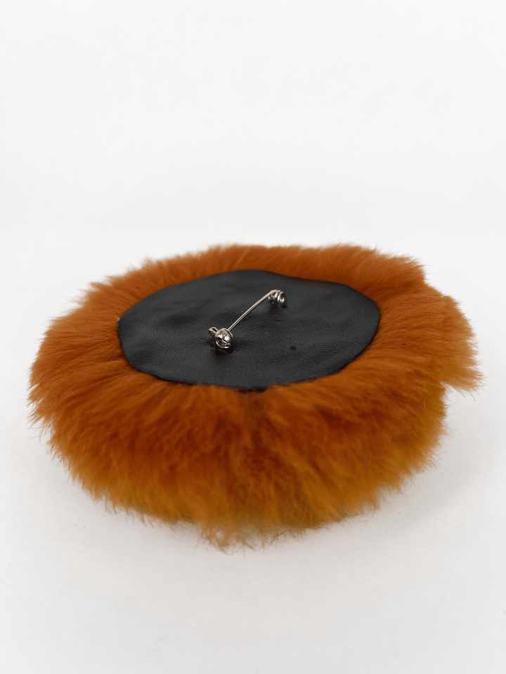 Orange fur brooch