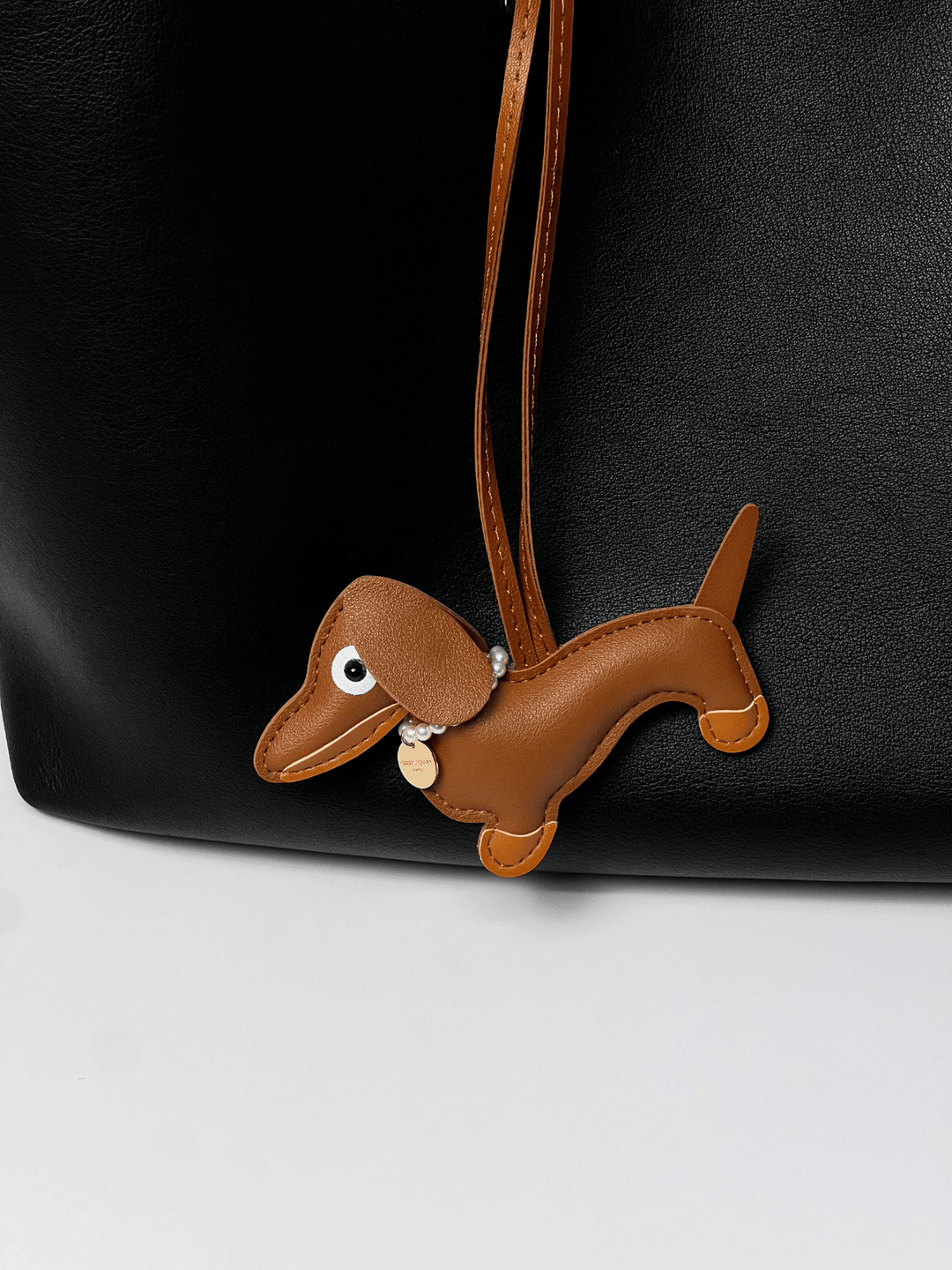 Tasche Charm Charly in Cognac